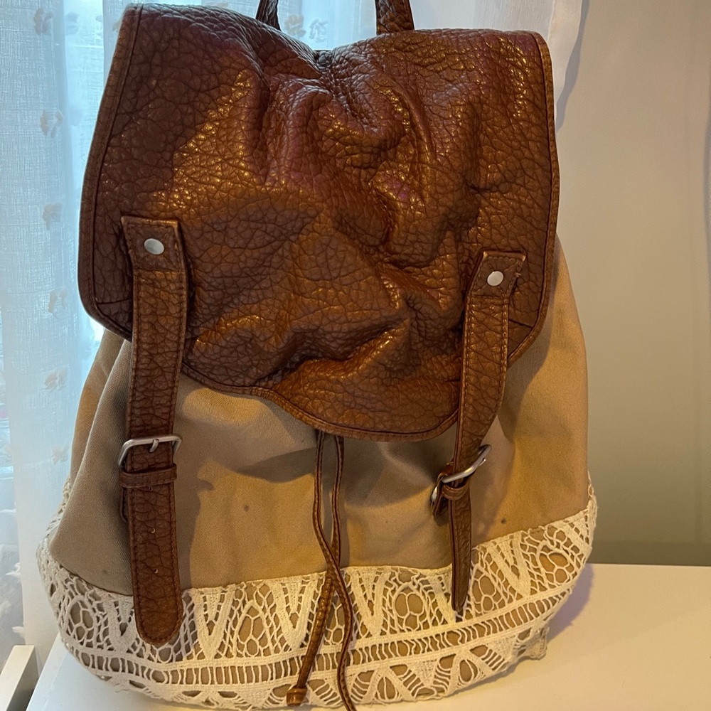 Aeropostale leather and lace straw string backpack